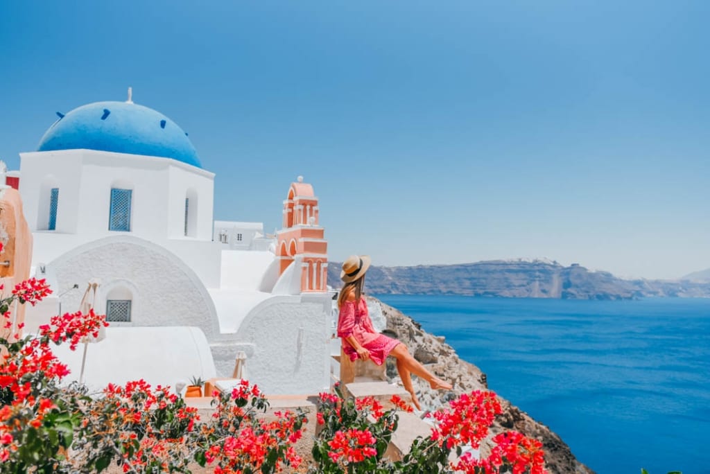 White and blue dome church Santorini Oia 5 Reasons Why You Should NOT Visit Santorini